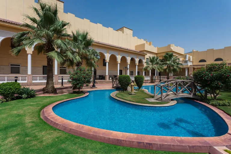 Palmtrees,shrubs,lawn